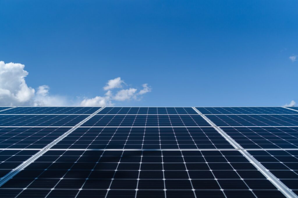 Photovoltaic solar power panel on sky background